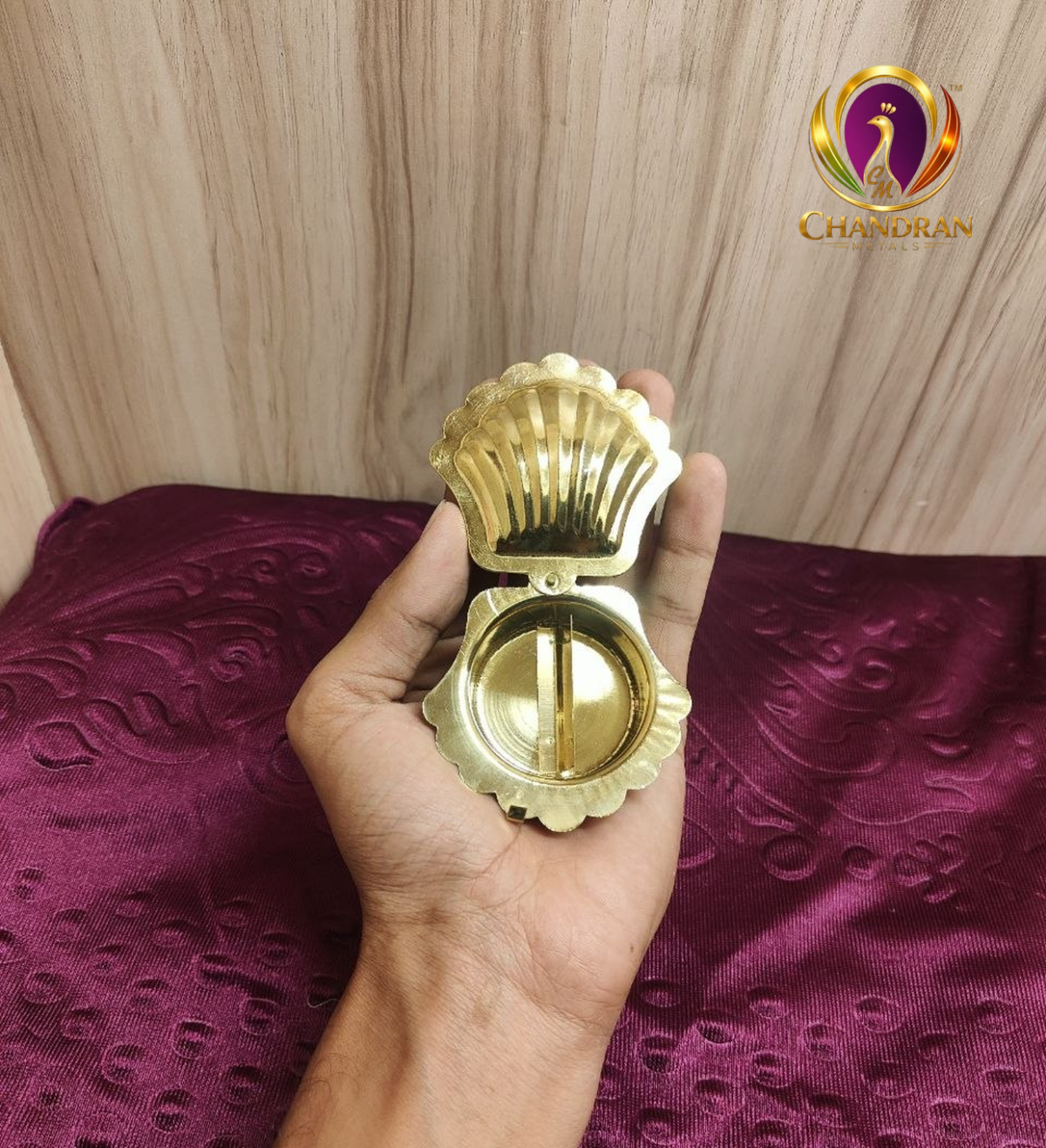 Brass Shell Shape KumKum Box 1 Inch open hand view